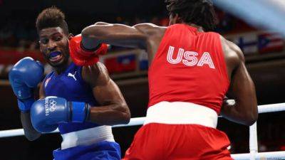 Umar Kremlev - International - Power struggle overshadows Paris Games as boxing's future hangs in balance - channelnewsasia.com - Usa - Los Angeles - Cuba