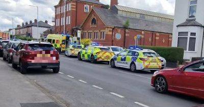 Emergency crews block road after elderly woman knocked down by car - manchestereveningnews.co.uk