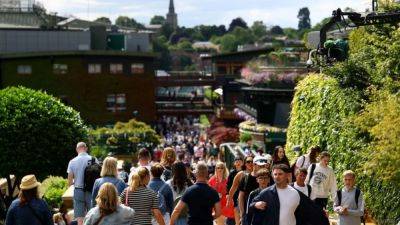 Thousands of fans arrive at Wimbledon as Grand Slam begins