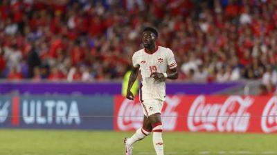 Thibaut Courtois - Alphonso Davies - Canada's Davies scores shootout penalty to bury World Cup demons - channelnewsasia.com - Qatar - Belgium - Usa - Argentina - Canada - Venezuela - state New Jersey - county Davie