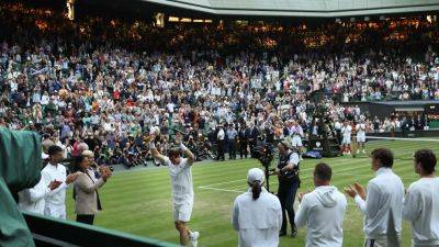 Wimbledon pays tribute to Andy Murray after doubles exit