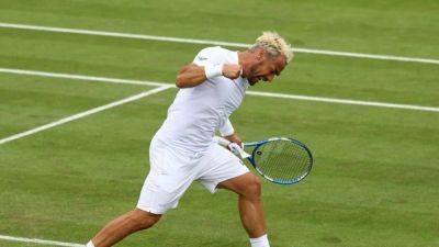 Casper Ruud - Fabio Fognini - Inspired Fognini knocks out eighth seed Ruud at Wimbledon - channelnewsasia.com - France - Italy