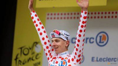 Pogacar solos to win Tour de France stage 14 in Pyrenees