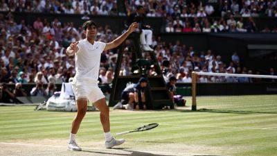 Alcaraz blows away Djokovic to retain Wimbledon title