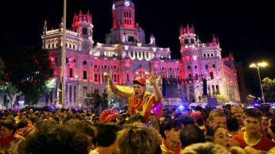 Ecstatic Spaniards take to the streets to celebrate national team Euro win