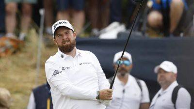 Lowry keeps his cool to stay ahead in Troon