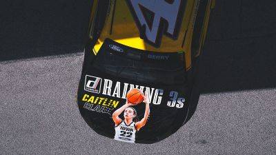 Image of Caitlin Clark displayed on hood of Josh Berry's car for Brickyard 400