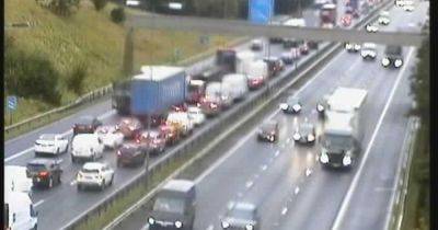 M62 LIVE traffic updates as long queues build due to 'overrunning roadworks'
