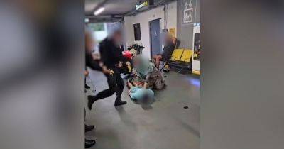 Police watchdog 'aware' of violent airport footage showing officer kicking and stamping on man's head during arrest