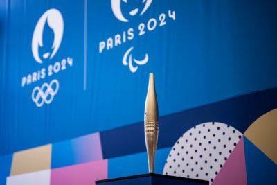 Drag Queen Carries Olympic Torch In Paris