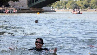 Paris Olympics - Anne Hidalgo - Swede's thorny question for Paris mayor after Seine swim - channelnewsasia.com - France