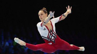 Gymnastics-German gymnasts choose full-body suits for comfort, freedom