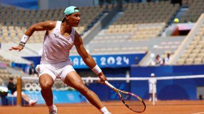 Nadal trains ahead of doubles opener despite injury worries