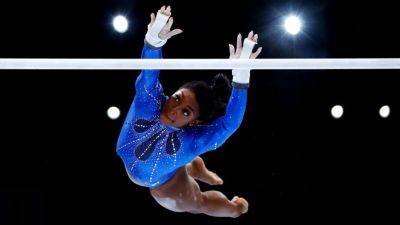 Simone Biles submits new uneven bars element for 2024 Olympics - ESPN