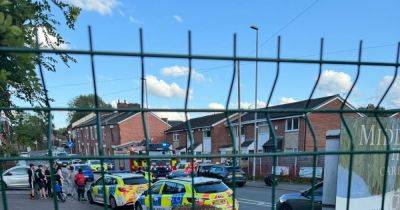 Police rush to scene after car smashes into parked vehicles - manchestereveningnews.co.uk