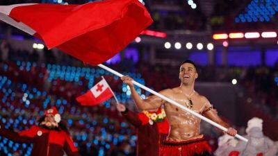 Paris Olympics - Jae C.Hong - Tonga Olympic flag bearer Pita Taufatofua abandons shirtless look for Paris opening ceremony - foxnews.com - Japan - Tonga - South Korea