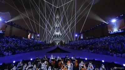 Rain-soaked Seine spectacle marks Paris Olympics opening; Singapore led by flagbearers Shanti Pereira, Ryan Lo