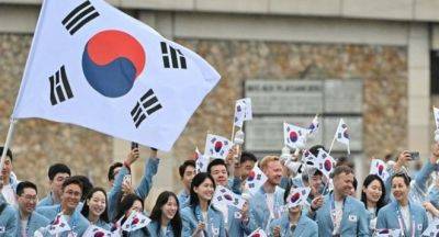Thomas Bach - Paris 2024: IOC apologises for South Korea, North Korea mix-up at opening ceremony - guardian.ng - Britain - France - South Korea - North Korea - Peru