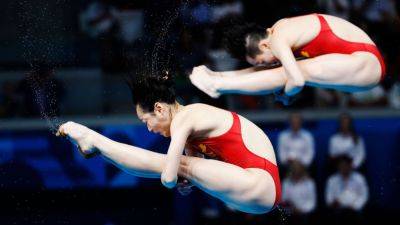 Paris Olympics - China wins first gold medals of 2024 Olympics in diving, air rifle - ESPN - espn.com - Britain - Russia - Usa - China - Los Angeles