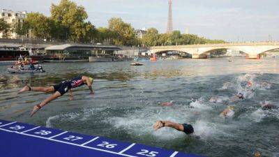 Organisers confident triathlon will go ahead despite rain impact on Seine