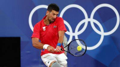 Novak Djokovic, Carlos Alcaraz post wins at Paris Olympics - ESPN