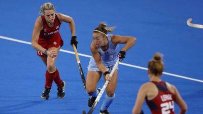 Hockey-Argentina women beat US, Dutch thrash France in wet start