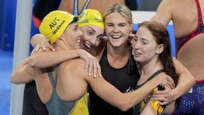 Australia's Jack celebrates gold after being banned from Tokyo