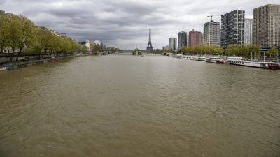Paris 2024: Seine training session off for triathletes due to water quality issues - rte.ie