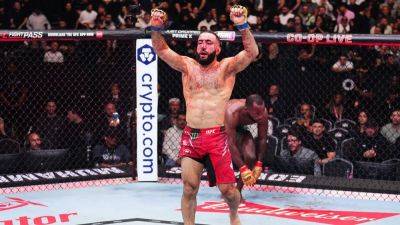 UFC 304: Muhammad dethrones Edwards, Aspinall makes quick work of Blaydes - ESPN