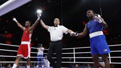 Twice champion Cesar La Cruz eliminated in opening bout - channelnewsasia.com - Kazakhstan - Azerbaijan - Cuba