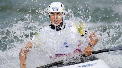 Canoeing-Waiting game ends in medal joy for Fox and Woods