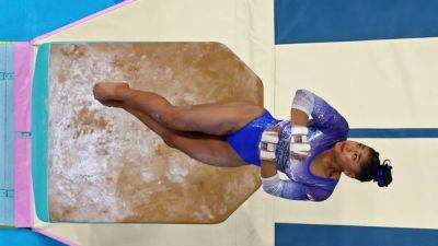Gymnastics-Heron does Panama proud with double Biles nod