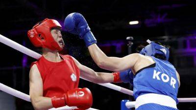 Taiwanese boxer gets walkover after Nigerian opponent's provisional suspension