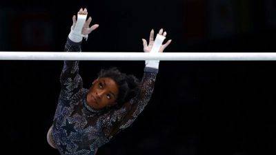 Gymnastics-Biles doing well, back at practice after injury scare, mom says