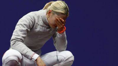 Fencing-Carnage for world number ones in third day of fencing at Paris Games