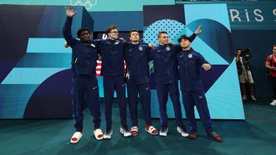 Team USA men's gymnastics take home bronze in team final, sing national anthem in celebration