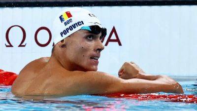 Popovici takes men's 200 metres freestyle gold