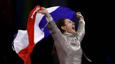 Fencing-France's Apithy-Brunet wins the gold in women's sabre at Paris Games