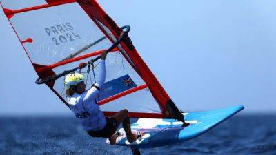 Sailing-Windsurfers get races under their harnesses after delays