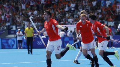 Hockey-Dutch men draw with Britain in the heat, India's Harmanpreet scores again
