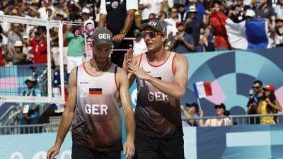 Beach volleyball-German duo struggle to communicate over bumping Paris party - channelnewsasia.com - Germany - Australia