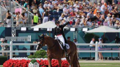 Equestrian-Denmark tops dressage qualifiers in first Grand Prix day