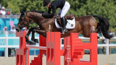 Paris Games - Equestrian-Horse welfare in focus as Versailles dressage hit by heatwave - channelnewsasia.com