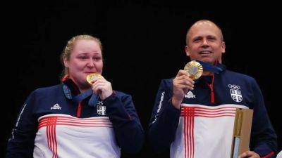 Shooting-Gold lightens grief for Serbia's pistol pair