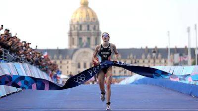 Victorious Beaugrand thrills home crowd with France's 1st individual Olympic triathlon medal