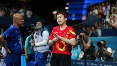 China's table tennis champ Wang Chuqin loses at Olympics after bat broken