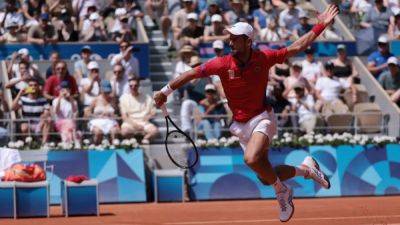 Carlos Alcaraz - Roland Garros - Rafa Nadal - Sebastian Baez - Stefanos Tsitsipas - Djokovic reaches quarter-finals in ominous fashion - channelnewsasia.com - Germany - Serbia - Argentina - Greece