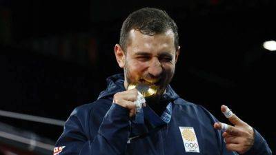 Judo-Georgian Bekauri retains judo title, Croatia's Matic wins historic gold