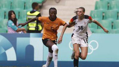 Group A - Bev Priestman - Vanessa Gilles - Canada reach Olympic quarter-finals despite six-point deduction - channelnewsasia.com - France - Germany - Spain - Brazil - Colombia - Australia - Canada - Japan - New Zealand - county Lyon