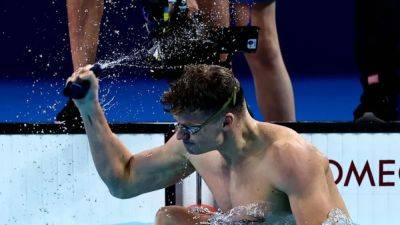France's Marchand makes history with golden double